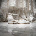Comfortable low heel bridal shoes with breathable lace mesh and sturdy block heel for garden or beach weddings.