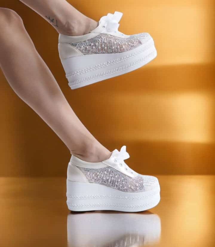 Get the perfect blend of elegance and comfort with these 8cm platform lace sneakers. Ideal for weddings, special occasions, or a stylish casual look. Shop now! available Beirut Lebanon